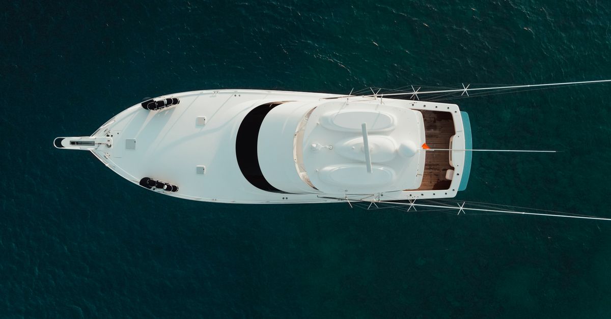 Modern catamaran anchored near Miami skyline